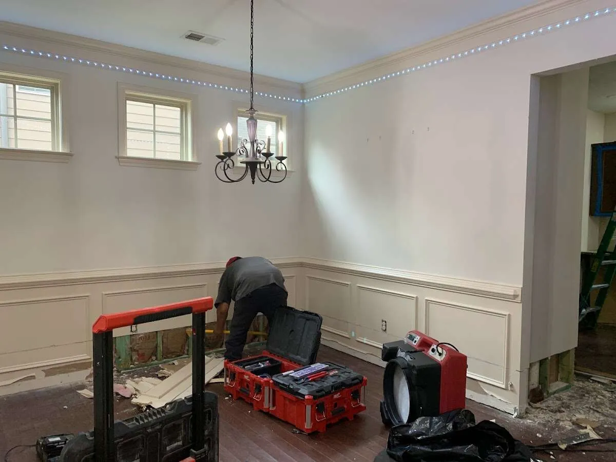 Restoration technician with professional equipment in Glen Burnie